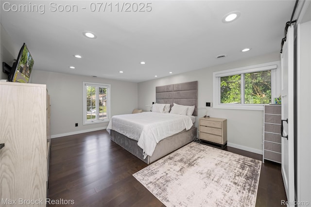 5534 Apple Ridge Trl, West Bloomfield, MI 48322 - bedroom featuring a barn door, recessed lighting, and dark wood-style flooring