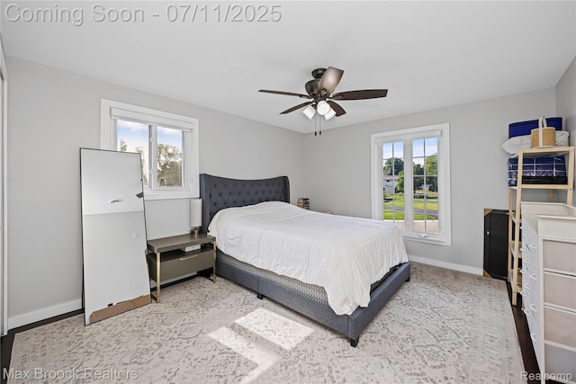 5534 Apple Ridge Trl, West Bloomfield, MI 48322 - bedroom with baseboards and ceiling fan