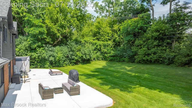 5534 Apple Ridge Trl, West Bloomfield, MI 48322 - view of grassy yard with a patio area