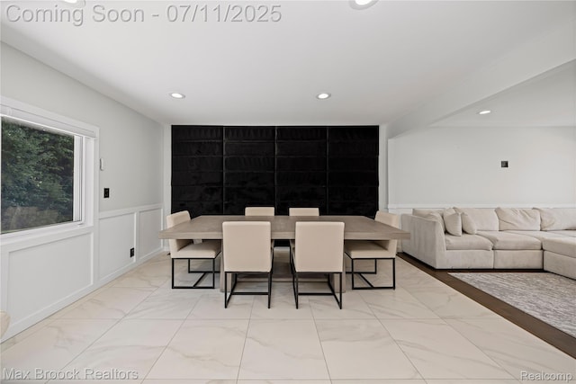 5534 Apple Ridge Trl, West Bloomfield, MI 48322 - dining room featuring marble look tile flooring, recessed lighting, and a wainscoted wall