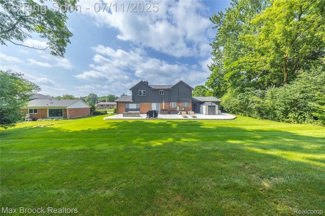 5534 Apple Ridge Trl, West Bloomfield, MI 48322 - back of property featuring a storage unit, brick siding, a patio area, and a yard