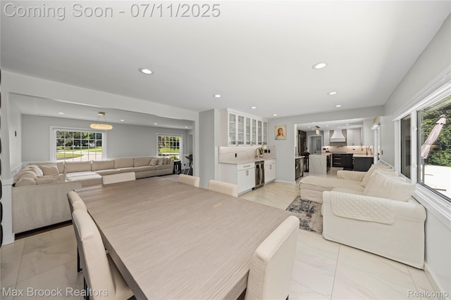 5534 Apple Ridge Trl, West Bloomfield, MI 48322 - dining room featuring light marble finish flooring, recessed lighting, and plenty of natural light