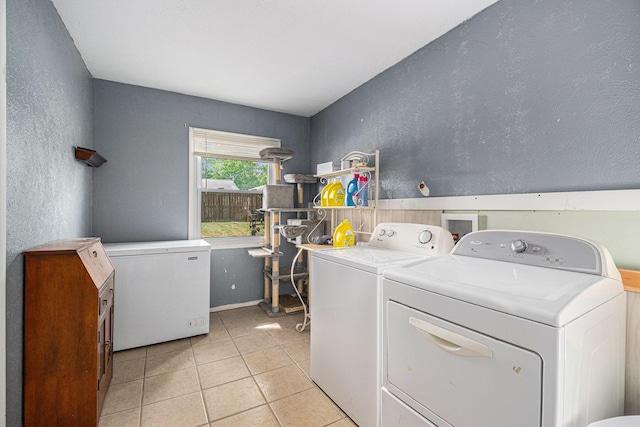 2416 S 16th, Niles, MI 49120 - laundry room featuring washer and dryer, a textured wall, and light tile patterned flooring