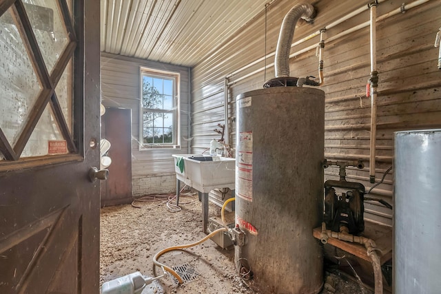 810 Newton Rd, Coldwater, MI 49036 - utility room with water heater and a sink