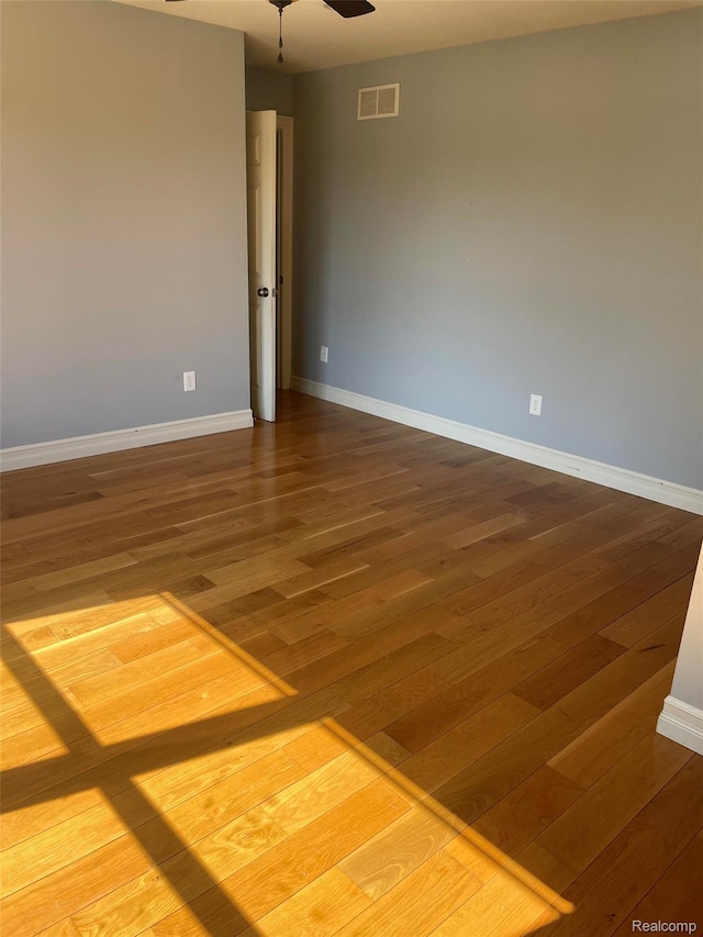 23364 Clark Rd, Belleville, MI 48111 - empty room featuring wood finished floors and a ceiling fan