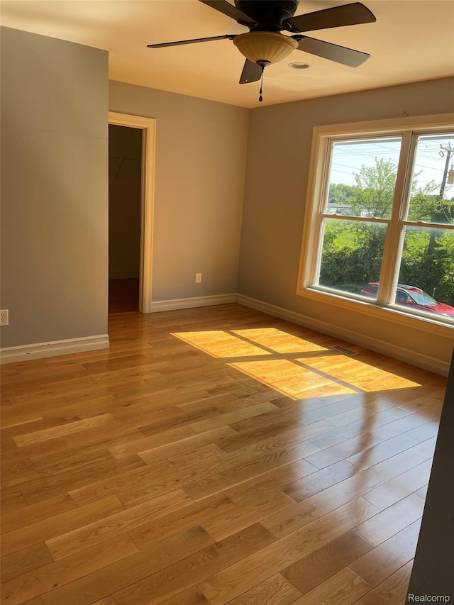 23364 Clark Rd, Belleville, MI 48111 - empty room featuring ceiling fan and light wood finished floors
