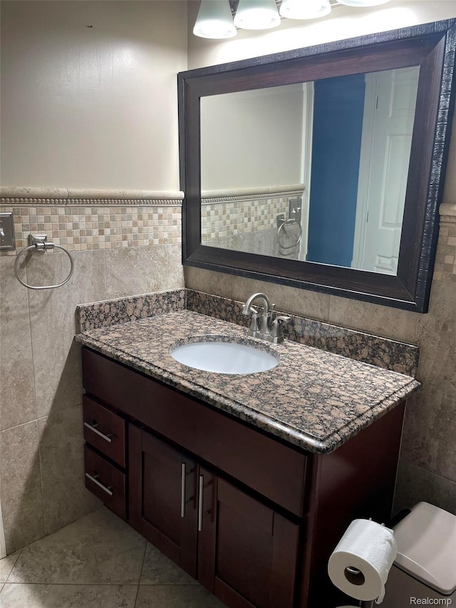 23364 Clark Rd, Belleville, MI 48111 - bathroom featuring tile walls, vanity, and tile patterned flooring