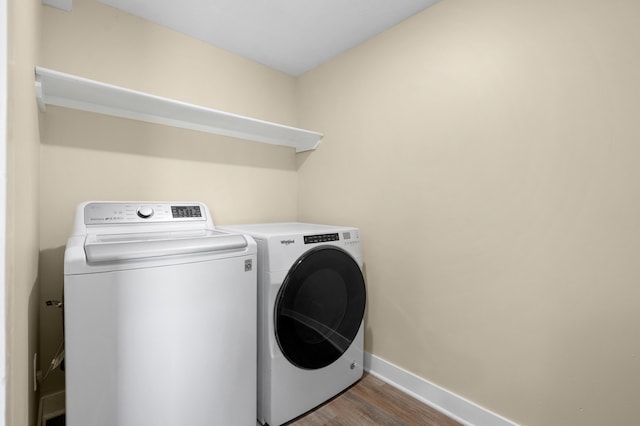 5743 107th Ave, Pullman, MI 49450 - laundry area with washing machine and clothes dryer and wood finished floors