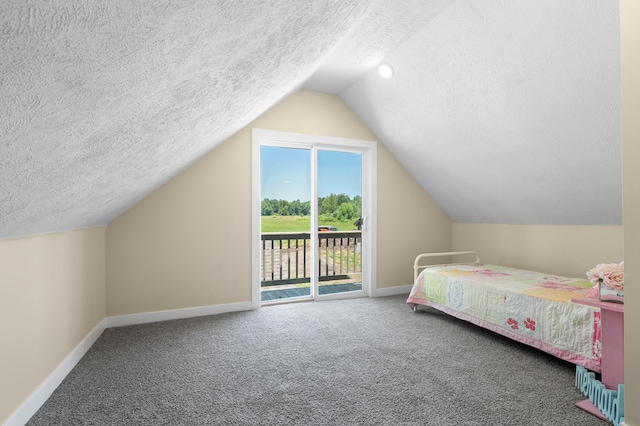 5743 107th Ave, Pullman, MI 49450 - carpeted bedroom with a textured ceiling, access to exterior, and vaulted ceiling