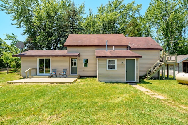5743 107th Ave, Pullman, MI 49450 - back of house featuring a patio, roof with shingles, and stairs
