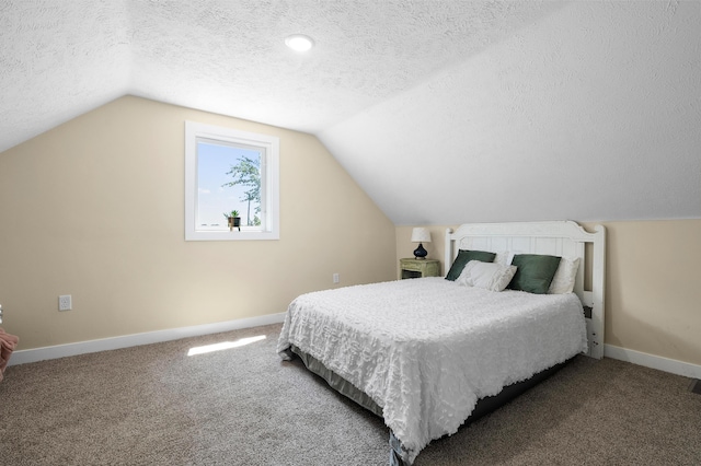 5743 107th Ave, Pullman, MI 49450 - bedroom featuring a textured ceiling, vaulted ceiling, and carpet flooring