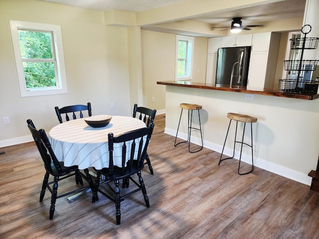 5743 107th Ave, Pullman, MI 49450 - dining space featuring wood finished floors and a ceiling fan