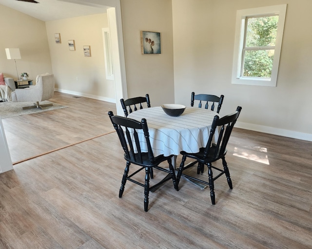 5743 107th Ave, Pullman, MI 49450 - dining space featuring wood finished floors and baseboards