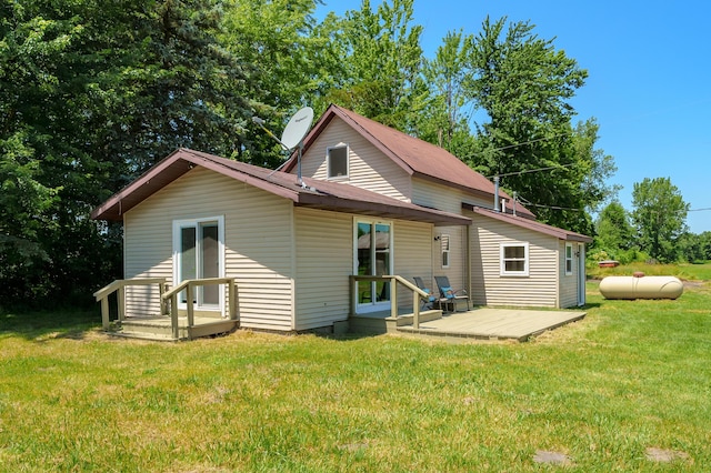 5743 107th Ave, Pullman, MI 49450 - rear view of house featuring a yard, a wooden deck, and a chimney