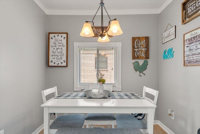 34066 Orangelawn St, Livonia, MI 48150 - dining area featuring a chandelier and crown molding