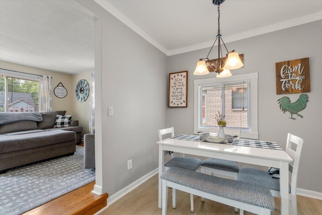 34066 Orangelawn St, Livonia, MI 48150 - dining space with a chandelier and light wood finished floors