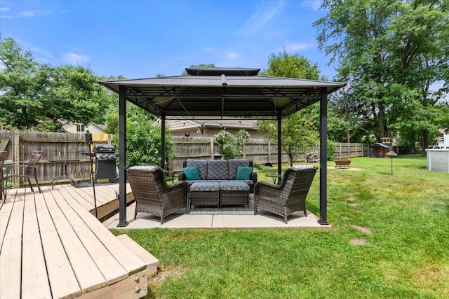 34066 Orangelawn St, Livonia, MI 48150 - fenced backyard with a gazebo, an outdoor living space with a fire pit, and a deck