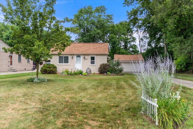 34066 Orangelawn St, Livonia, MI 48150 - view of front facade featuring a front yard and a garage