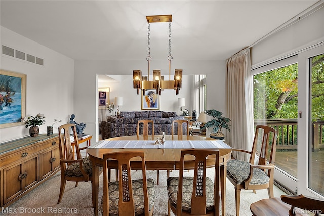 3350 Franklin Rd, Bloomfield Hills, MI 48302 - dining area featuring light colored carpet and a chandelier
