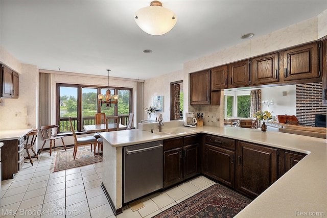 3350 Franklin Rd, Bloomfield Hills, MI 48302 - kitchen with dishwasher, light countertops, a peninsula, a chandelier, and dark brown cabinets