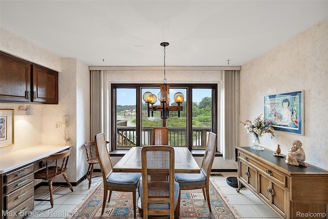 3350 Franklin Rd, Bloomfield Hills, MI 48302 - dining area with light tile patterned floors and a chandelier