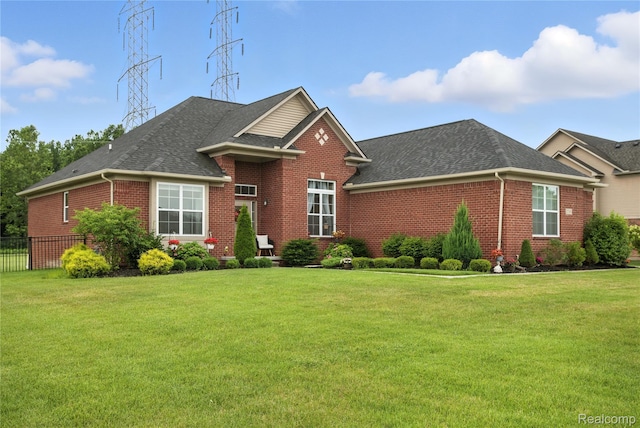 27245 Ritter Blvd, Flat Rock, MI 48134 - view of front of house with brick siding and a shingled roof