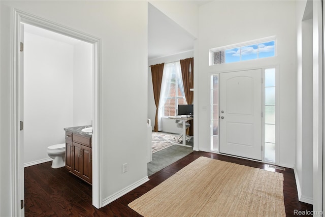 27245 Ritter Blvd, Flat Rock, MI 48134 - entryway with dark wood-type flooring and a high ceiling