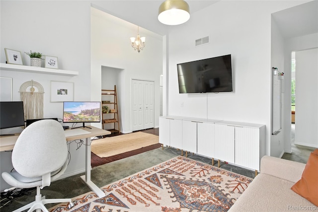 27245 Ritter Blvd, Flat Rock, MI 48134 - carpeted office space featuring a towering ceiling and a chandelier
