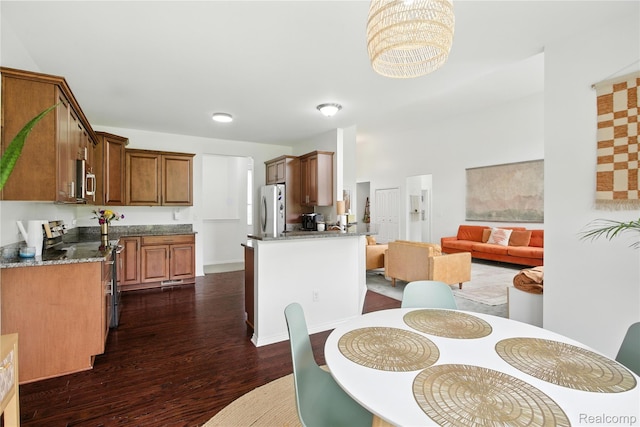 27245 Ritter Blvd, Flat Rock, MI 48134 - dining area featuring dark wood-style floors and a chandelier