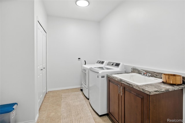 27245 Ritter Blvd, Flat Rock, MI 48134 - laundry room with washing machine and clothes dryer and cabinet space