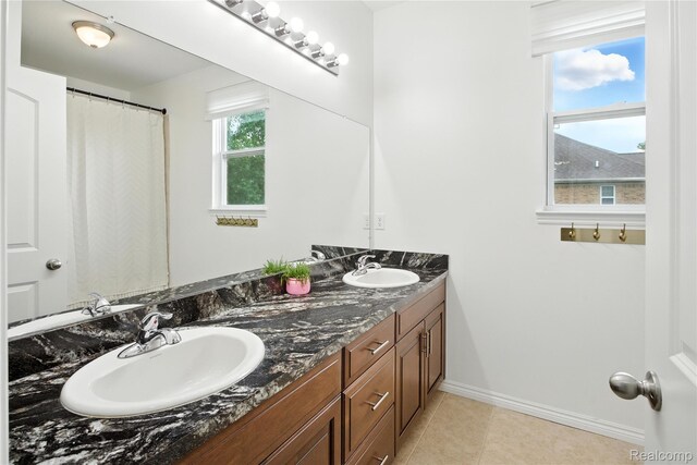 27245 Ritter Blvd, Flat Rock, MI 48134 - full bath featuring double vanity and tile patterned floors