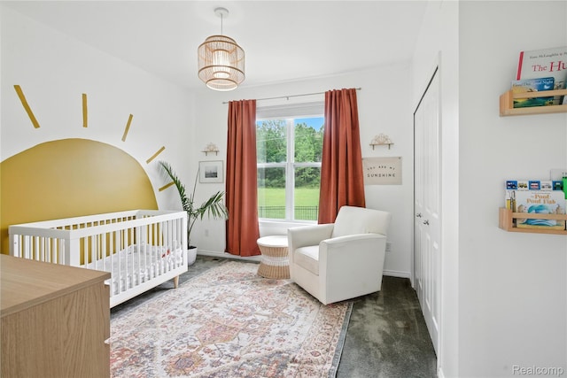 27245 Ritter Blvd, Flat Rock, MI 48134 - carpeted bedroom with a nursery area and baseboards