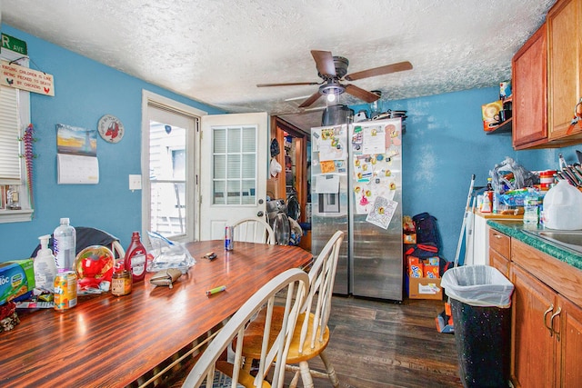 1638 Superior St, Niles, MI 49120 - dining area with a ceiling fan, a textured ceiling, and dark wood finished floors