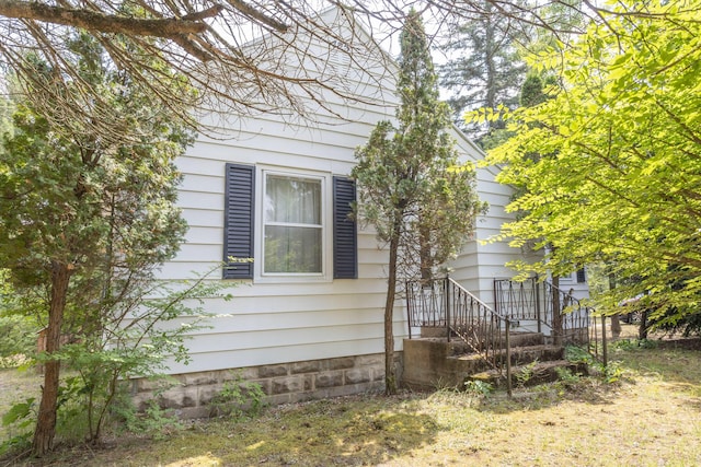 425 6th St, Baldwin, MI 49304 - view of side of home