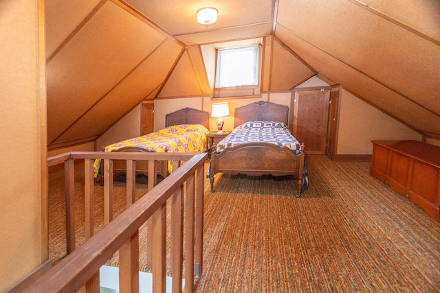 425 6th St, Baldwin, MI 49304 - carpeted bedroom featuring vaulted ceiling