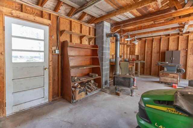 425 6th St, Baldwin, MI 49304 - basement featuring a wood stove