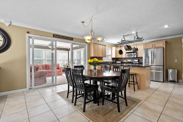 16069 Grazenview St, Schoolcraft, MI 49087 - dining space featuring ornamental molding, light tile patterned flooring, ceiling fan, recessed lighting, and a textured ceiling