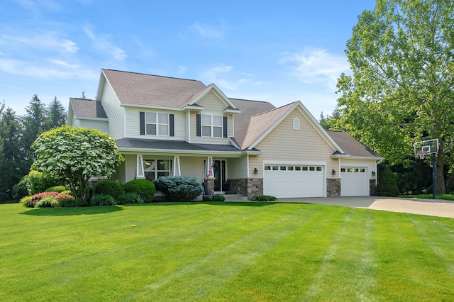 16069 Grazenview St, Schoolcraft, MI 49087 - view of front of property featuring driveway, an attached garage, a front lawn, and covered porch