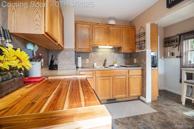 32247 Annapolis St, Wayne, MI 48184 - kitchen featuring wood counters and decorative backsplash
