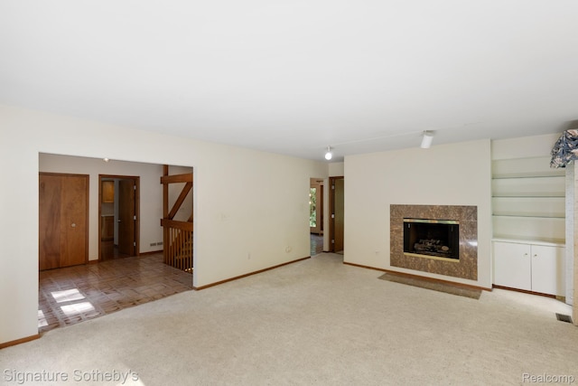 26311 W 14 Mile Rd, Franklin, MI 48025 - unfurnished living room with carpet floors and a premium fireplace