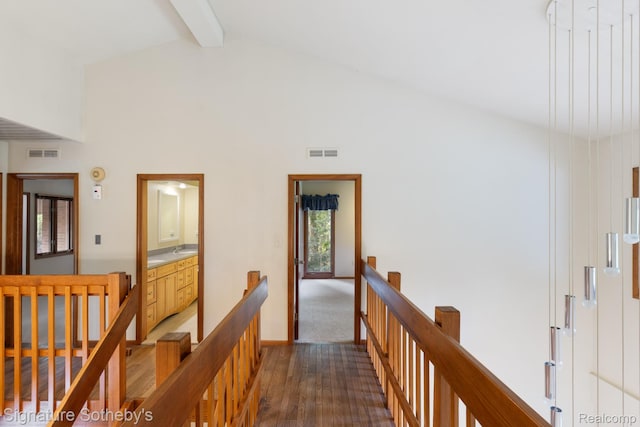 26311 W 14 Mile Rd, Franklin, MI 48025 - corridor featuring an upstairs landing, dark wood finished floors, beamed ceiling, and high vaulted ceiling