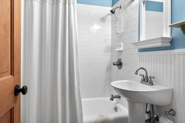 5515 Kaiser Rd, Sawyer, MI 49125 - bathroom featuring shower / tub combo and wainscoting