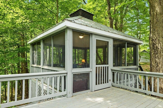 5515 Kaiser Rd, Sawyer, MI 49125 - wooden deck with a sunroom