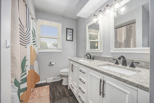 1440 Chevelle, Jenison, MI 49428 - bathroom featuring double vanity and wood finished floors