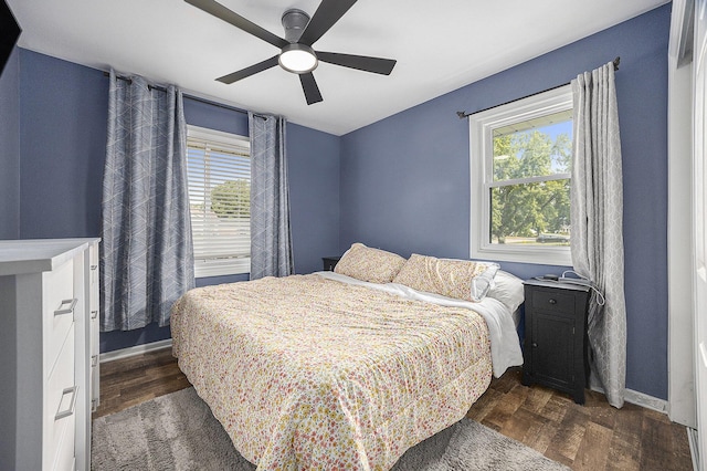1440 Chevelle, Jenison, MI 49428 - bedroom featuring multiple windows, dark wood-style floors, and a ceiling fan