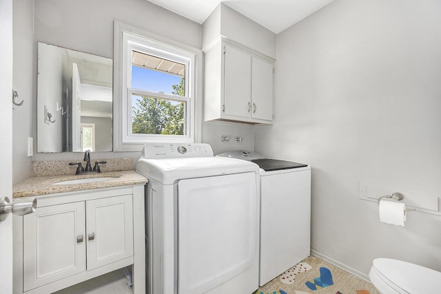 1440 Chevelle, Jenison, MI 49428 - washroom with washing machine and clothes dryer and baseboards