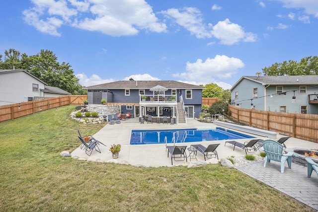 1440 Chevelle, Jenison, MI 49428 - view of pool with a fenced backyard, a patio area, stairway, and a fire pit