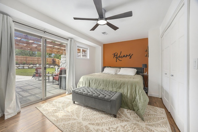 1440 Chevelle, Jenison, MI 49428 - bedroom with access to outside, wood finished floors, a closet, and a ceiling fan