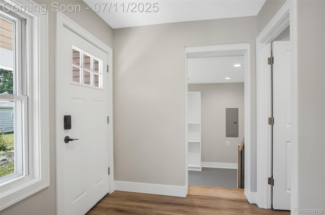 22222 Evergreen St, Macomb, MI 48082 - foyer entrance with electric panel, wood finished floors, and recessed lighting