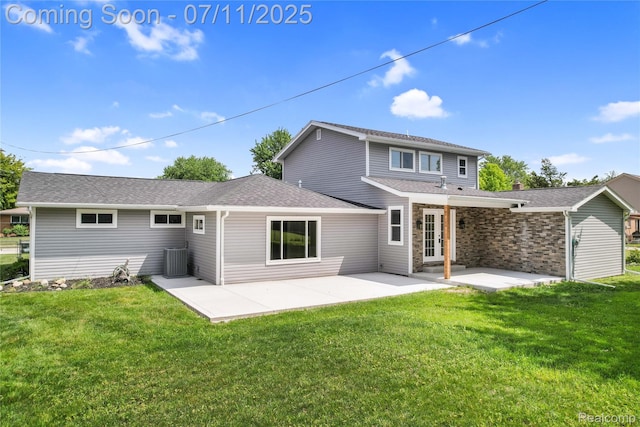 22222 Evergreen St, Macomb, MI 48082 - back of property featuring a lawn, a patio, and a shingled roof